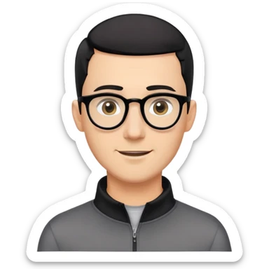 Caucasian man with black hair cut extremely short (almost buzz cut), short beard with gray streaks, large black eyeglasses, cheerful expression, black long sleeve shirt with quarter zip collar sticker