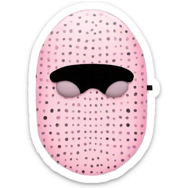 Light pink sleep mask with black dots on sticker