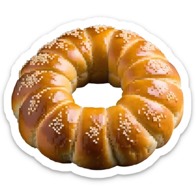 A traditional Turkish circular sesame bread, resembling a ring with a hole in the middle, covered in sesame seeds. It has a golden brown color. sticker