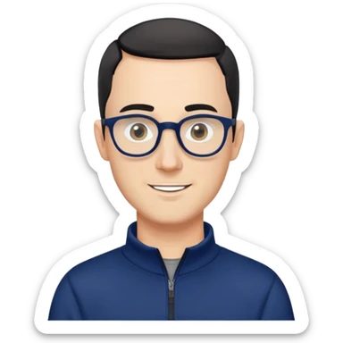 Caucasian man with very short black hair (close-cropped buzz cut), short beard with gray streaks, large black eyeglasses, cheerful expression, navy blue long sleeve sweatshirt with quarter zip sticker