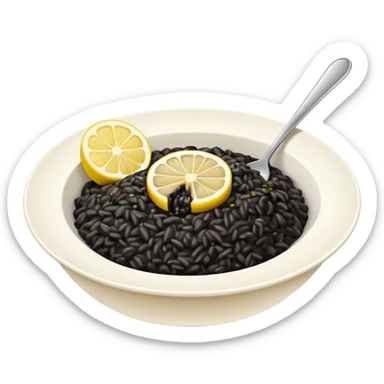 black risotto in a white bowl with a slice of lemon sticker