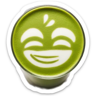 matcha latte in a clear glass with latte art sticker