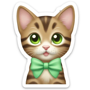 kawaii brown tabby kitten with green eyes and pastel green bow on head sticker