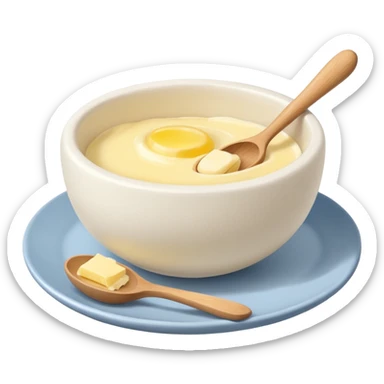 a dozen eggs, a ceramic mixing bowl with a wooden spoon and a plate of butter sticker