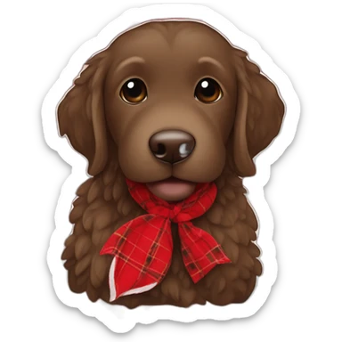 Chocolate brown colored doodle with a red and black flannel hankerchief holding a plush trout fish chew toy sticker