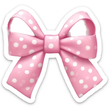 A light pink bow that has polka dots on it  sticker