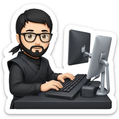 Man with black hair and beard wearing glasses in a ninja costume typing on a computer keyboard sticker