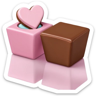 Two square milk chocolate 2 pralines only, Each praline is a sharp-edged cube with smooth glossy chocolate coating, placed in a small white fluted paper candy cup. On top of each cube is a flat pastel pink heart-shaped icing, thin and smooth, slightly translucent, with fine sugar crystal sparkle. sticker