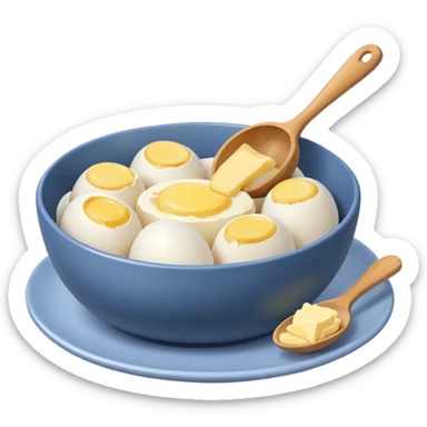 a dozen eggs, a ceramic mixing bowl with a wooden spoon and a plate of butter sticker