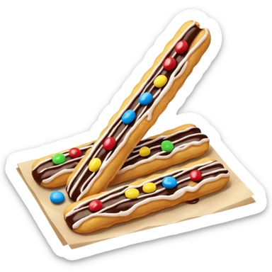 Add chocolate drizzle and m&ms on top of the crispy golden churros, put then on a paper sticker