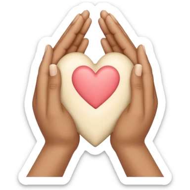 Hands joined in prayer with a cream heart sticker