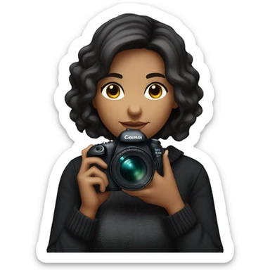 Female photographer with short, dark hair, wearing a black sweater, holding a Canon 5D Mark IV camera with an 85mm lens. She has a calm, focused expression and is looking straight ahead, showcasing a professional yet relaxed passion for photography. sticker