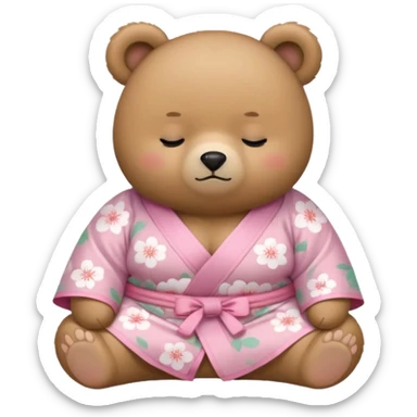 A cute chubby light-brown bear wearing a pastel pink sakura-patterned kimono, tiny body and round head, adorable simple face, sleepy half-closed eyes, small blush on cheeks, sitting while dozing off, tiny “zzz” floating above the head sticker