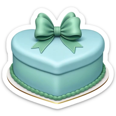 Heart shaped pastel blue birthday cake with a huge deep green bow sticker