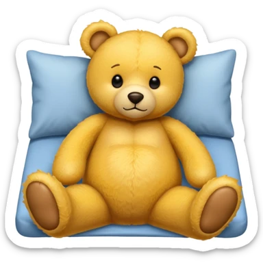 Fuzzy yellow teddy bear tucked in bed  sticker