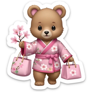 A cute baby bear character in pastel style, standing upright like a human. 
Light brown soft fur, large round ears, rounded paws and feet. 
Wearing a pink kimono with soft cherry blossom patterns on the sleeves and bottom, Holding a cute pastel shopping bag with one paw, walking pose. sticker