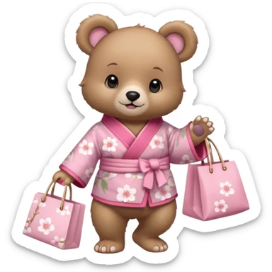 A cute baby bear character in pastel style, standing upright like a human. 
Light brown soft fur, large round ears, rounded paws and feet. 
Wearing a pink kimono with soft cherry blossom patterns on the sleeves and bottom, Holding a cute pastel shopping bag with one paw, walking pose. sticker