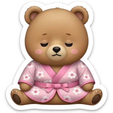A cute chubby light-brown bear wearing a pastel pink sakura-patterned kimono, tiny body and big round head, adorable simple face, sleepy half-closed eyes, small blush on cheeks, sitting while dozing off, tiny “zzz” floating above the head sticker