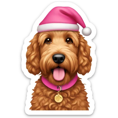 Red golden doodle with pink Santa hat, and pink collar sticker