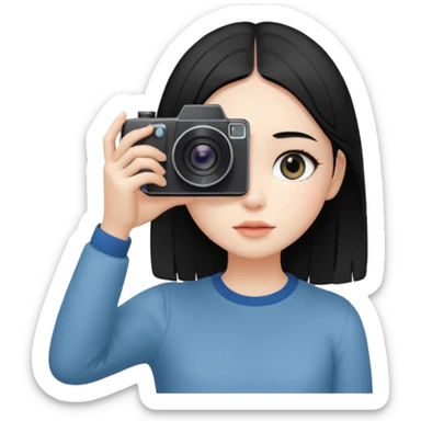 A young fair-skinned girl with straight black hair holding a camera up to her eye, looking through the viewfinder, standing in natural light, soft focus background, candid photography style, wearing a minimalist outfit, artistic and modern atmosphere.   sticker