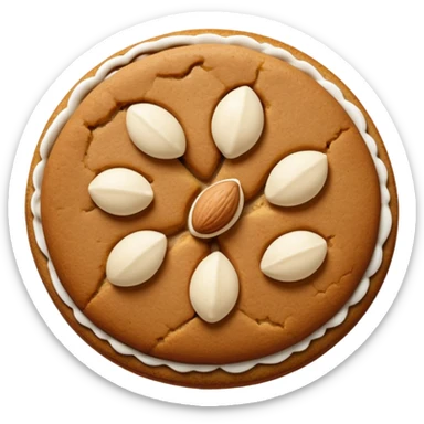round gingerbread with three white almonds on top, seen from above sticker