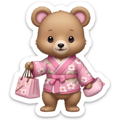 A cute baby bear character in pastel style, standing upright like a human. 
Light brown soft fur, large round ears, rounded paws and feet. 
Wearing a pink kimono with soft cherry blossom patterns on the sleeves and bottom, Holding a cute pastel shopping bag with one paw, walking pose. sticker