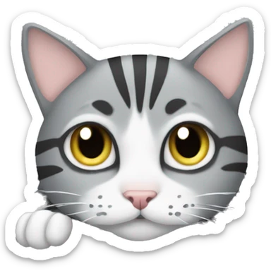 A striped grey cat is lying on the keyboard of the computer sticker