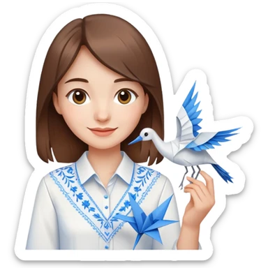 A happy Ukrainian young girl with brown hair in a white embroidered shirt holds an origami blue crane sticker