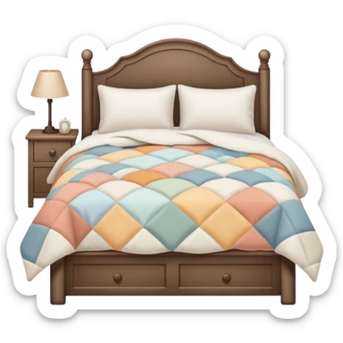 white bed with cozy quilt in muted colors  sticker
