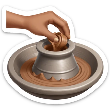 single hand scooping a mound of clay on a silver pottery wheel sticker