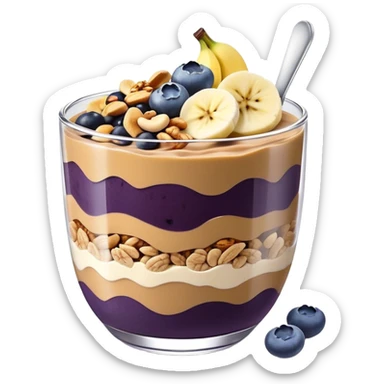 Açai bowl in a clear cup with layers of peanut butter, cashew nuts, granola, condensed milk and banana sliced and blueberrys on top sticker