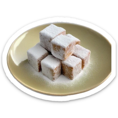 Turkish delight stacked cubes with chopped walnuts and covered with powdered sugar, on a porcelain plate sticker