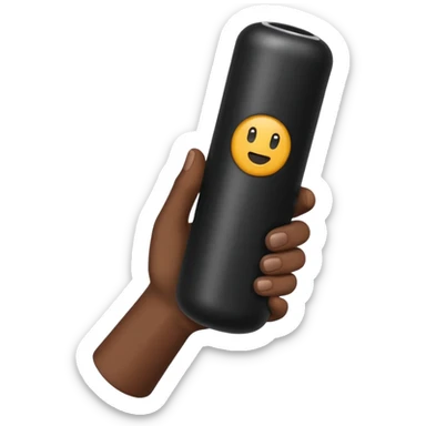 a hand holding a black tube sticker