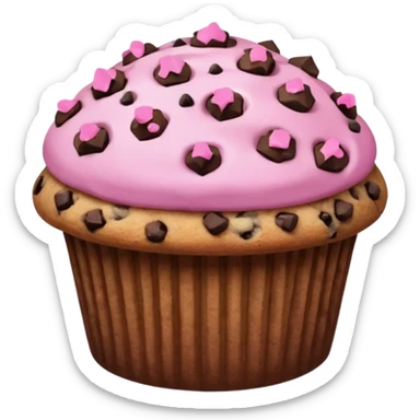 A pink muffin with chocolate chips and chocolate chip cookie topping sticker