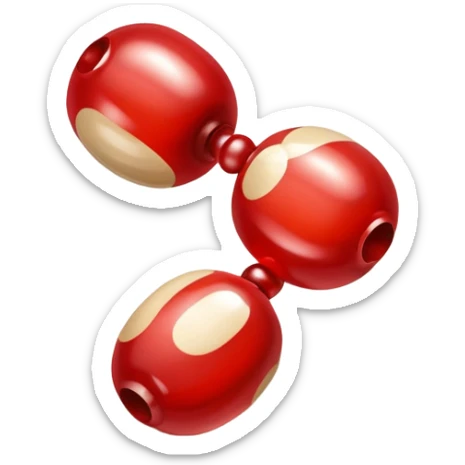 a pair of magatama (comma-shaped jewel beads) on top of one another in red and beige isometric view sticker