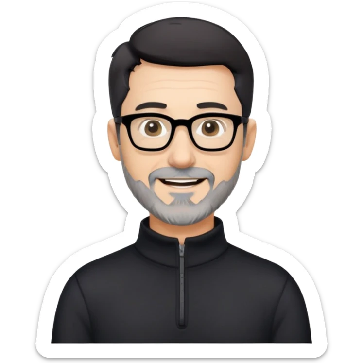 Caucasian man with very short black hair, short graying beard, large black eyeglasses, cheerful expression, black long sleeve shirt with quarter zip at collar sticker