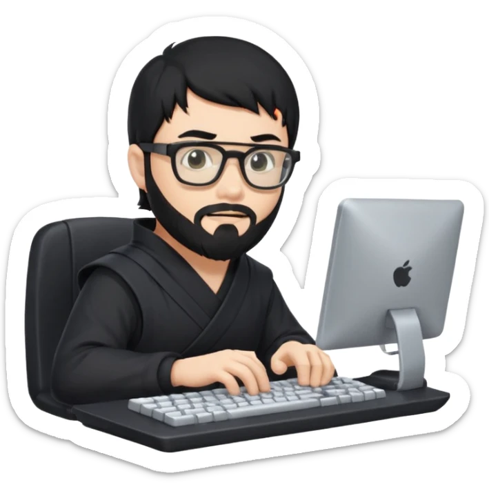 Man with black hair and beard wearing glasses in a ninja costume typing on a computer keyboard sticker