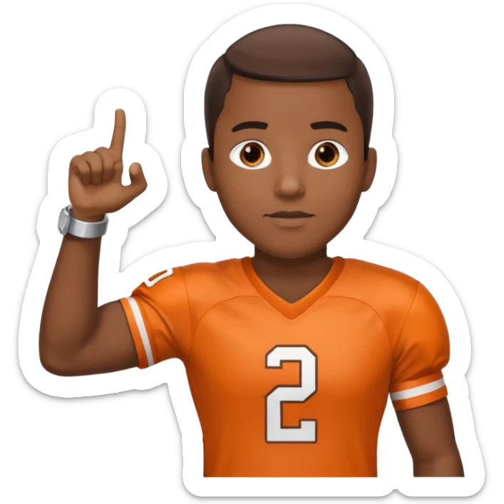 Black man in a brown and orange football jersey holding up his left arm with a watch on, pointing at the watch with his right hand sticker
