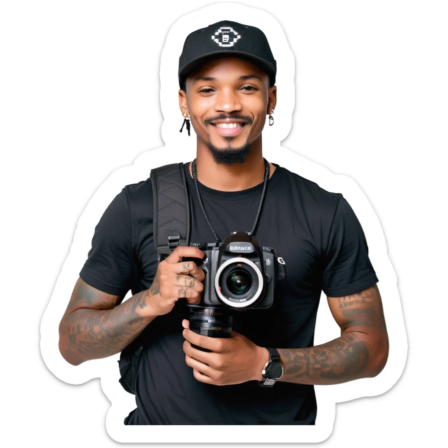 A young, black, South African, male cinematographer dressed in a black round neck t-shirt, black pants and black baseball cap holding a mirrorless dslr camera in one hand. Dark brown eyes. Bright white smile. Minimal facial hair — a small moustache connected to a goatee. Arms covered in tattoos. sticker