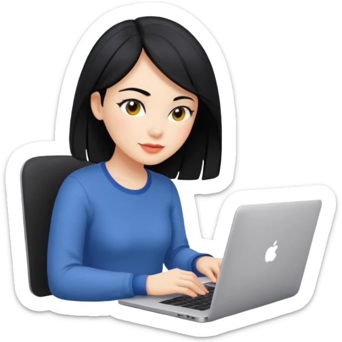 woman UX designer with black hair working on a laptop with color swatches sticker