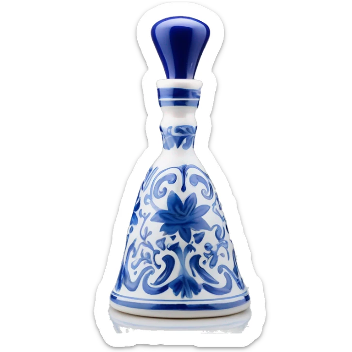 The Clase Azul Tequila bottle is tall and hourglass-shaped, with a wide base that tapers towards the neck. Its white ceramic body is decorated with cobalt blue floral designs, and it’s topped with a gray, bell-shaped stopper that curves inward. sticker