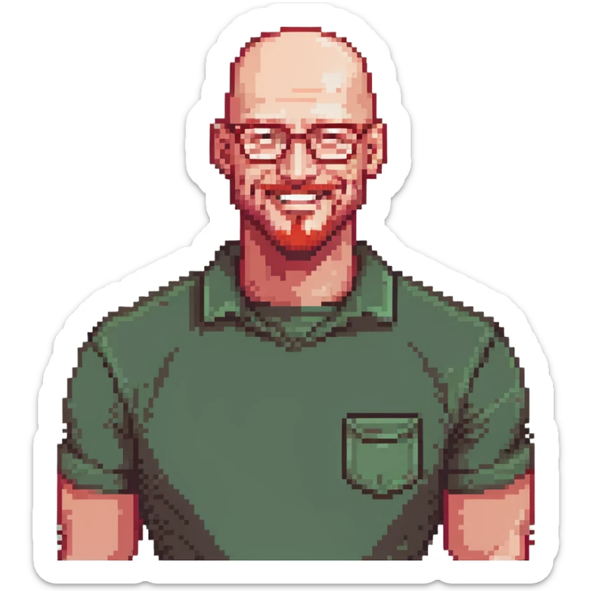 muscular bald man with red goatee and glasses, smiling, wearing a green shirt sticker