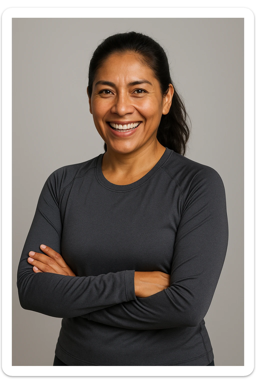 Portrait of a 40-year-old Peruvian woman, wheat-colored skin, dark hair, active and healthy attitude, lead-colored sportswear, friendly and energetic face, ideal for a supplement brand aimed at Peruvian adults. sticker