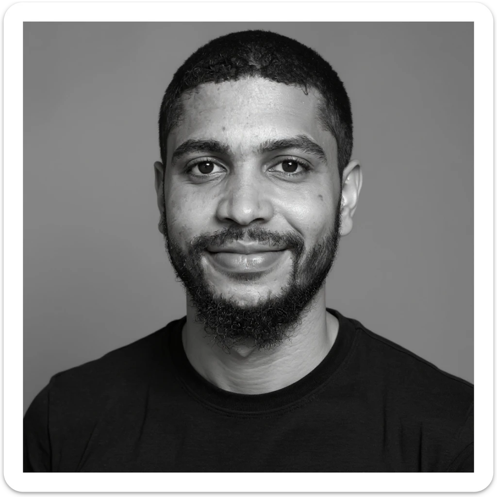A professional portrait in monochrome. Plain black crew neck shirt. Tailored to LinkedIn. Tech boy vibe (programmer) sticker