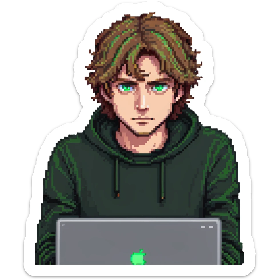 man with light brown hair and green eyes, laptop open, focused expression, minimal background sticker