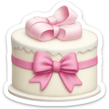 White cake with a pink bow sticker