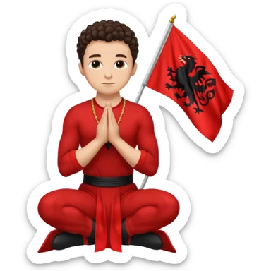 Brunette man clean shaven with slick back curly hair on his knees praying to an Albanian flag sticker