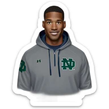 marcus freeman head coach of the university of notre dame wearing under armour sweatshirt hoodie with irish on it sticker