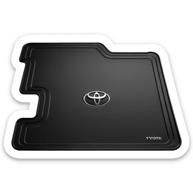 a black textured surface, likely a piece of automotive trim or a floor mat, featuring the branding for a Toyota Fortuner.
 sticker
