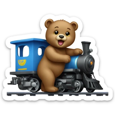 Baby bear playing with a train sticker